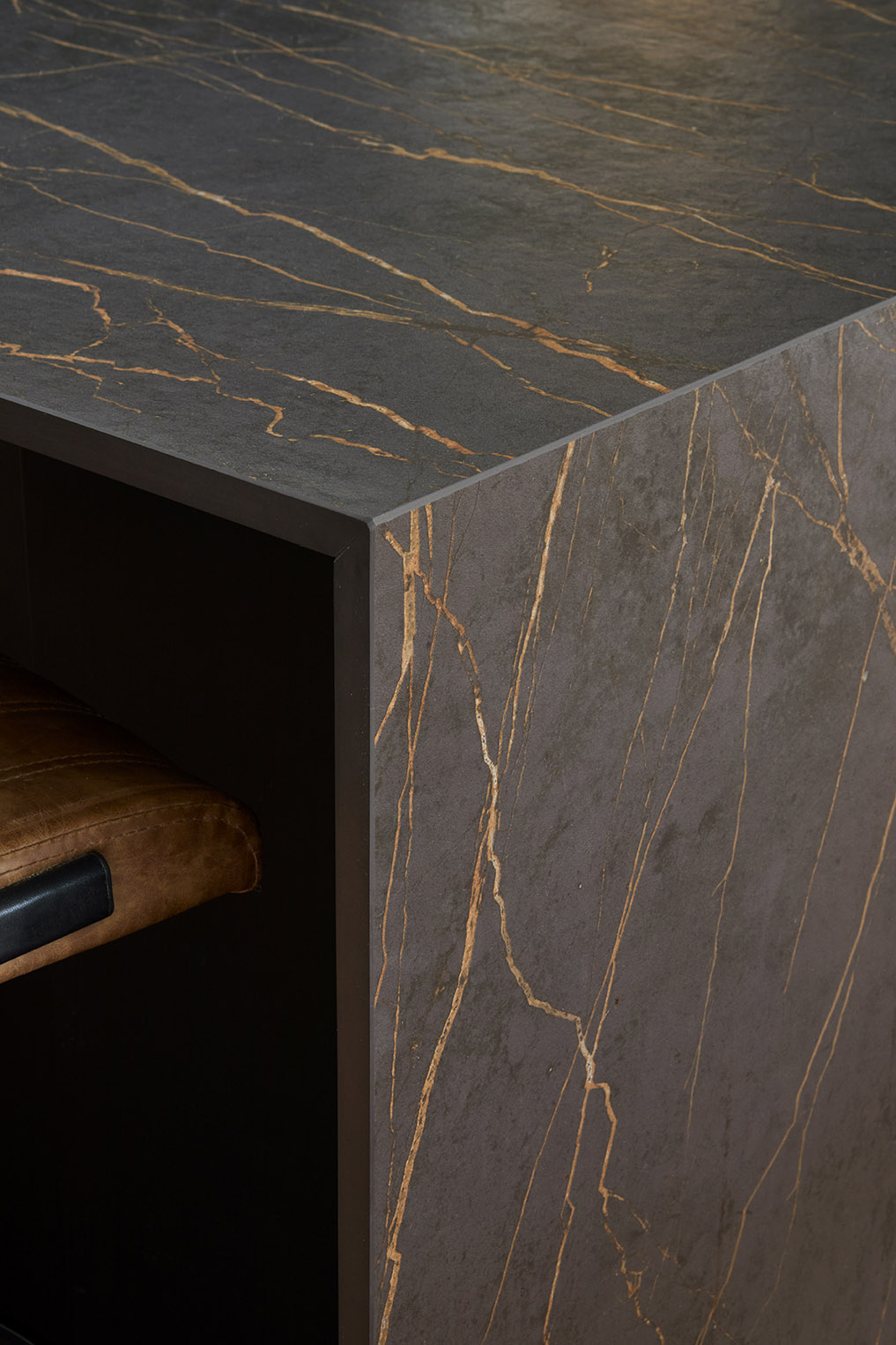 Large Dekton worktops finish the kitchen units beautifully.